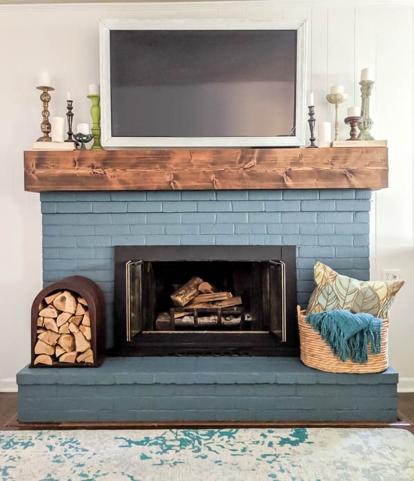 DIY rustic fireplace mantel: the cure for a boring fireplace