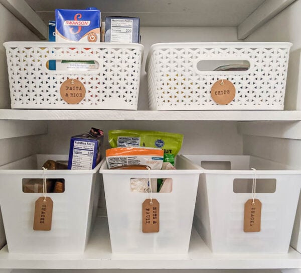 https://www.lovelyetc.com/wp-content/uploads/2020/02/organizing-a-small-pantry-with-dollar-store-bins-600x543.jpg