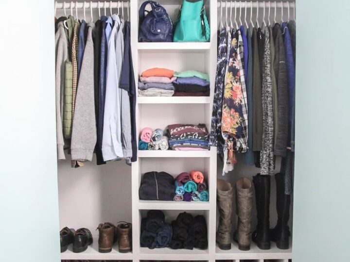 https://www.lovelyetc.com/wp-content/uploads/2021/03/diy-closet-organizer-in-small-closet-filled-with-clothes-and-shoes-720x540.jpg