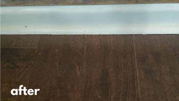 Engineered wood floor after repairing scratches.