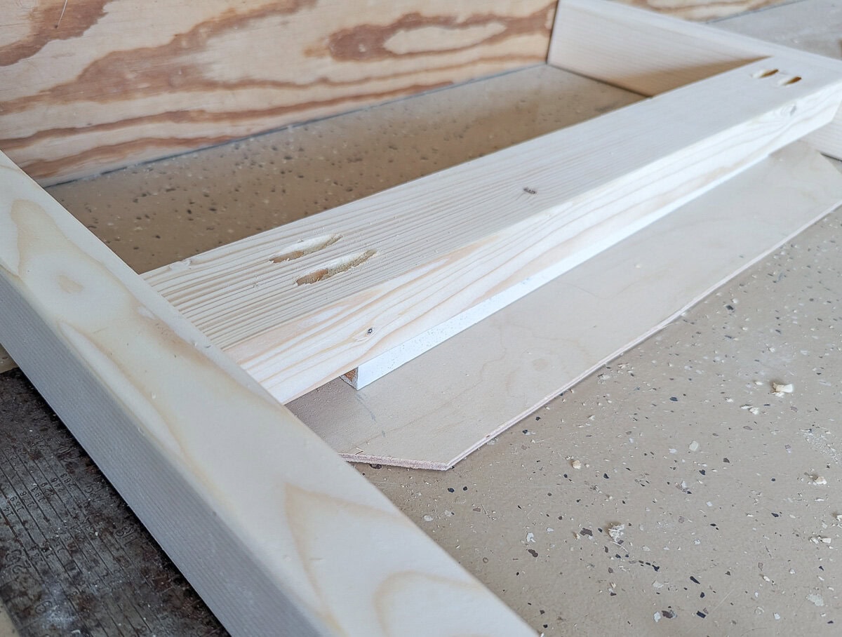 assembling outdoor chair sides.