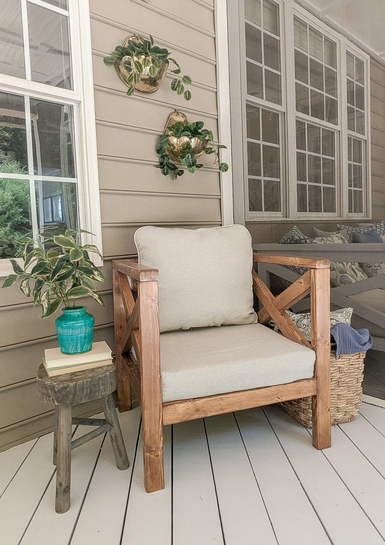 diy outdoor chair and thrifted decor on back porch.